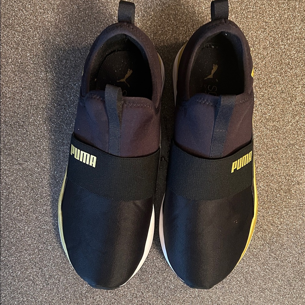 Puma Soft Ride sneakers. Size 8. Black, gold accents, white sole. EUC